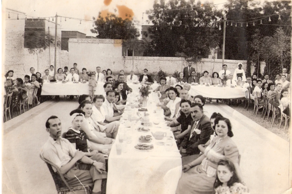 'Rabbi Malka at the Head of a Communal Meal'. Credit: Tales of Jewish Sudan